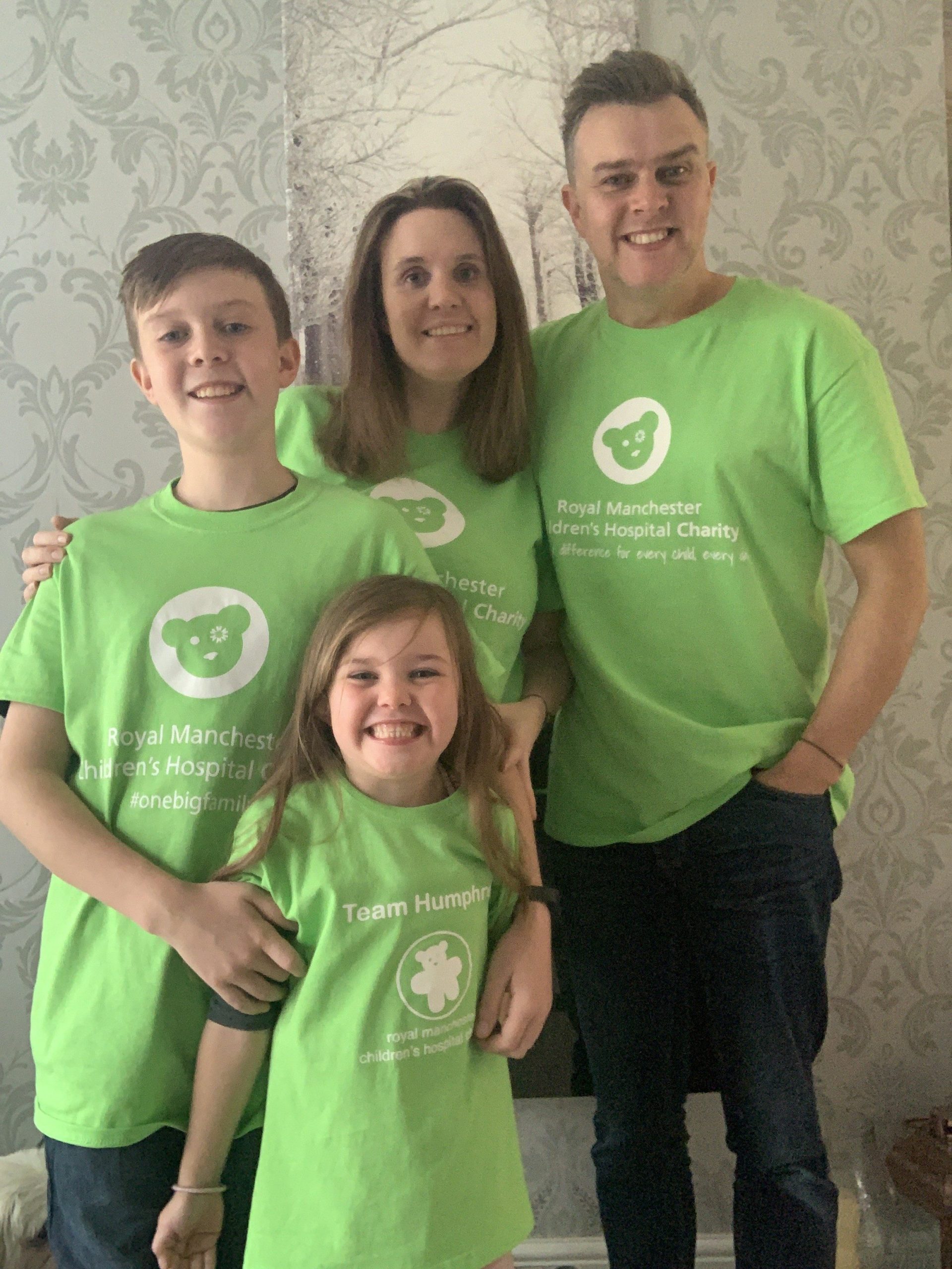 A. Tom, Gemma, Charlie and Sofia wearing Royal Manchester Childrens Hospital Charity Tshirts