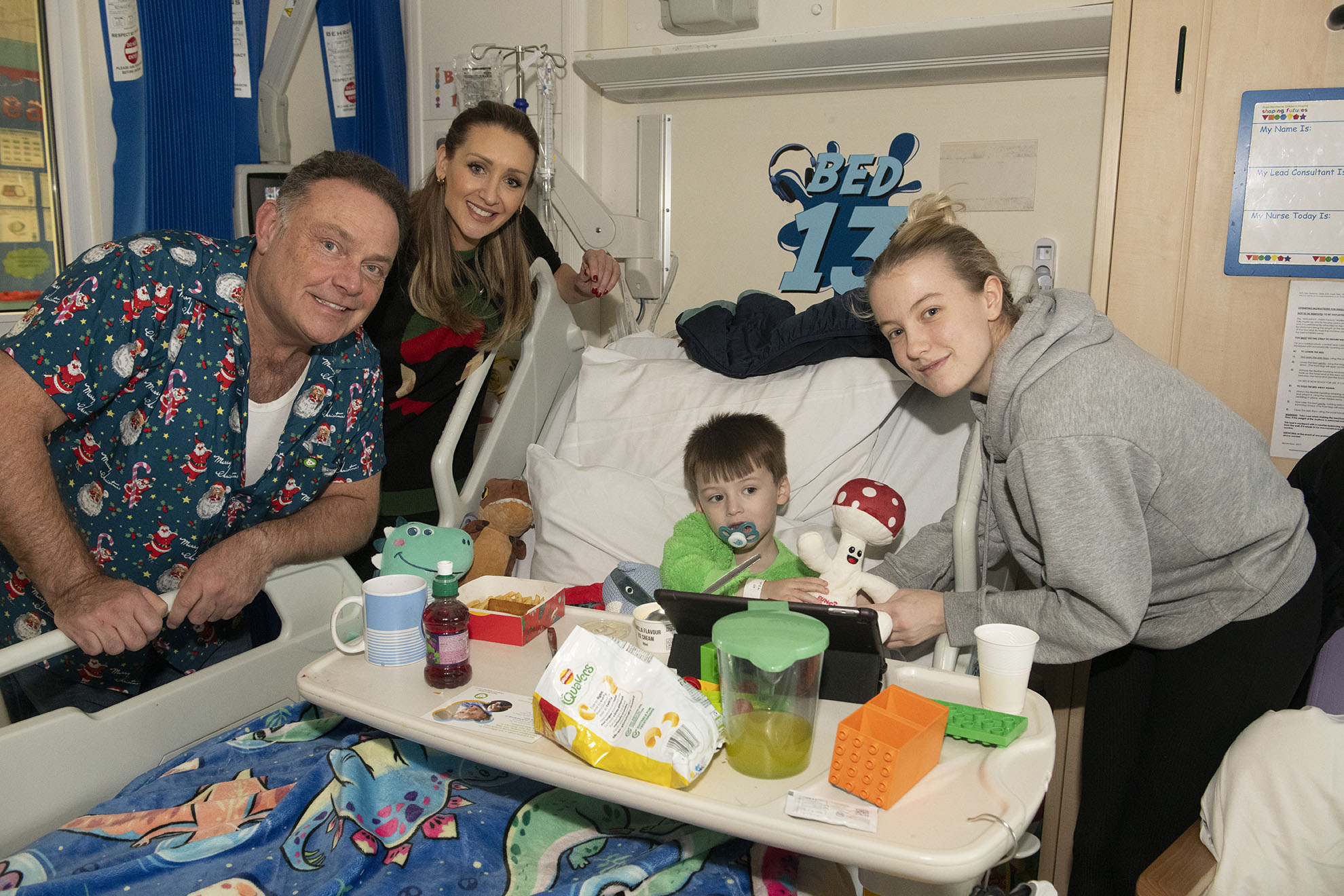 John Thomson and Cath Tyldesley with Riley and his mum Ellie