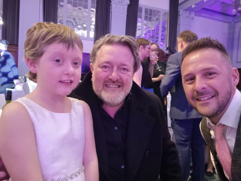 PixieBelle and dad Andy with Elbow's Guy Garvey