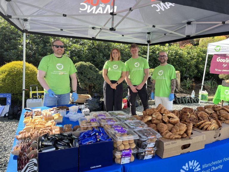 Renew Hub team members volunteering at food stall during Tour de Manc